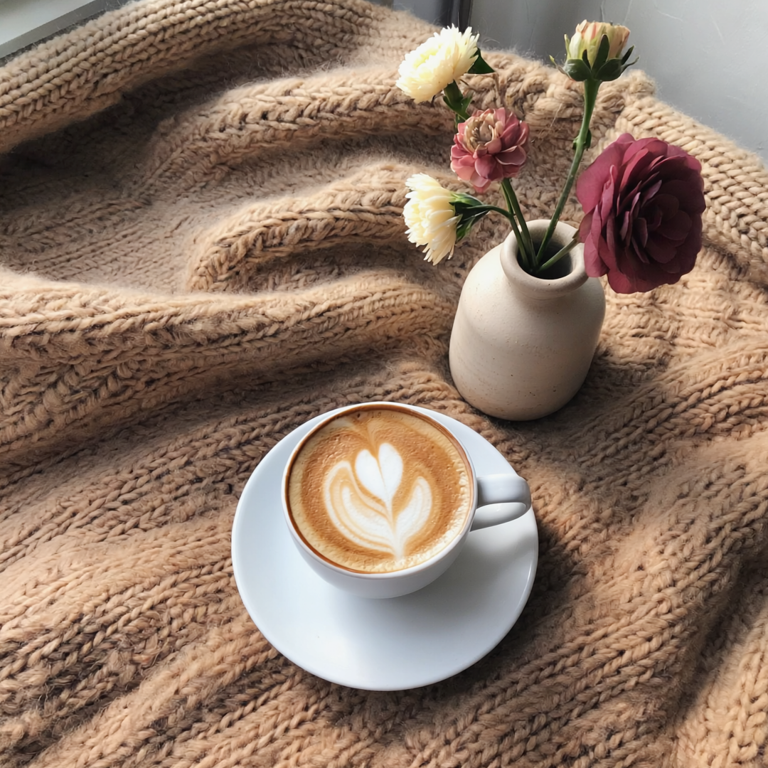 Balanced by Nature - Smooth refined coffee with natural flowers on blanket